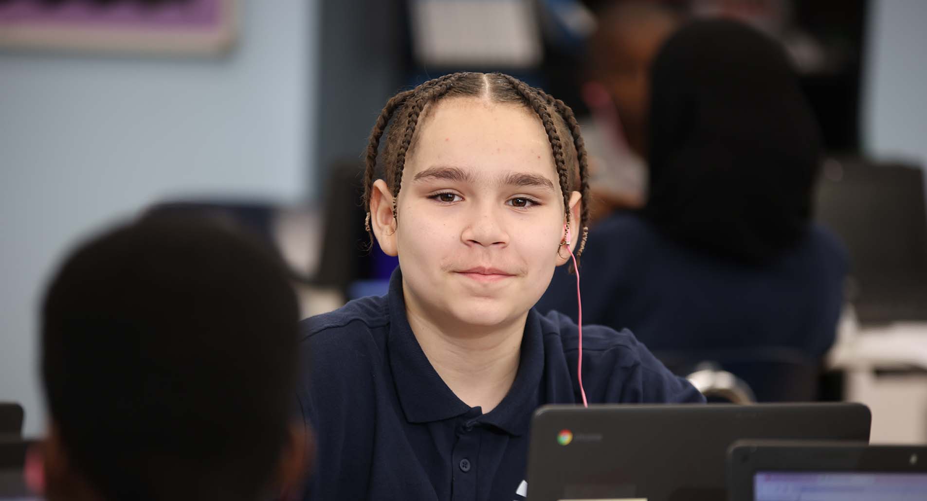 Teacher helping student